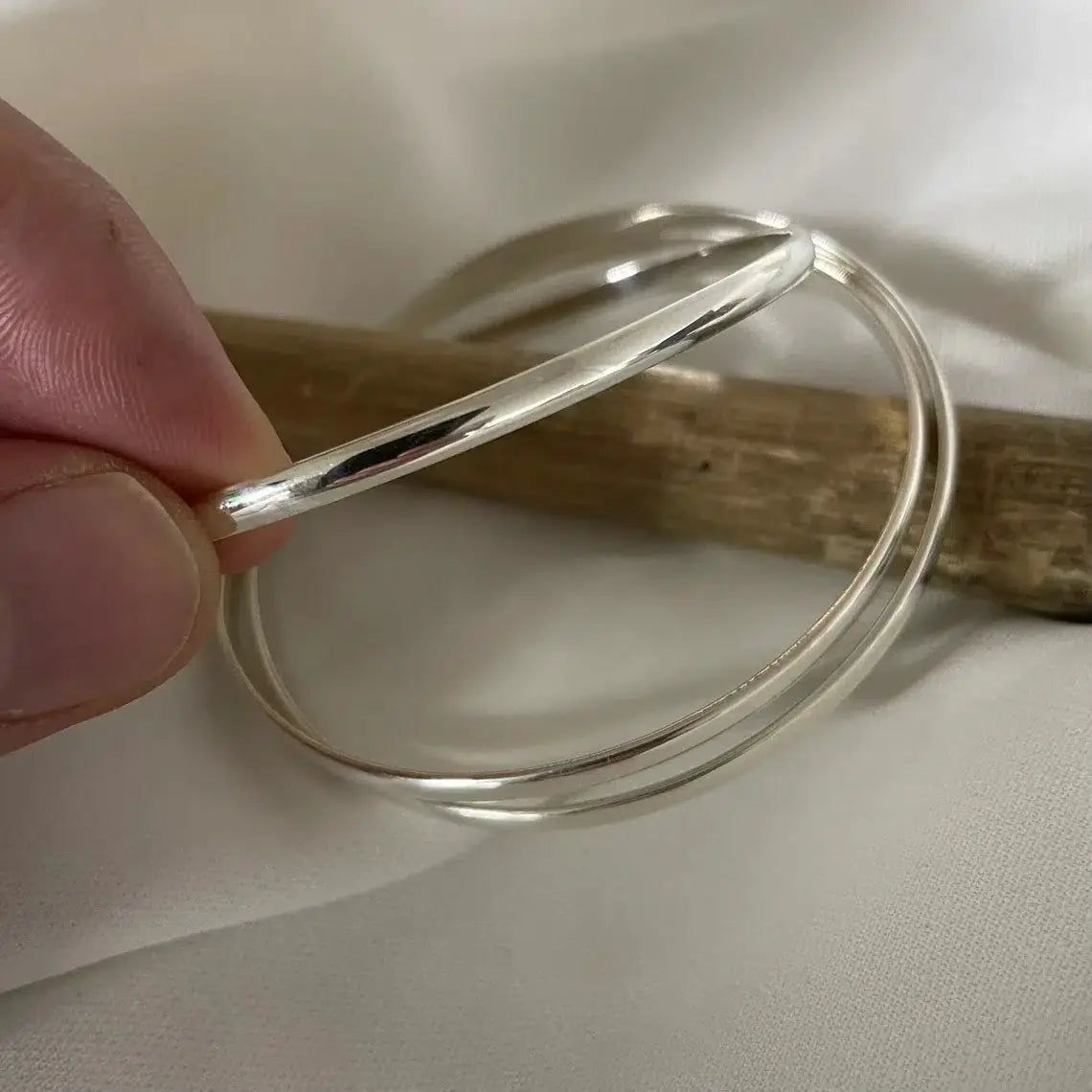 Sterling Silver Russian Rolling Interlocking Bangle – 18.7g Ladies Bracele Sterling Silver Ladies Russian Rolling Interlocking Bangle 18.7 Grams limanilondon