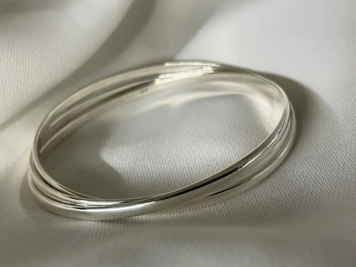 Sterling Silver Russian Rolling Interlocking Bangle – 18.7g Ladies Bracele Sterling Silver Ladies Russian Rolling Interlocking Bangle 18.7 Grams limanilondon